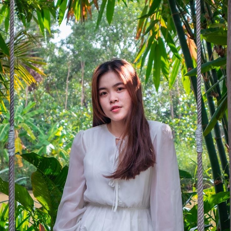 Kaveri Mehta, Lead Design Curator at HushedStudioHub, reviewing corporate floral arrangements